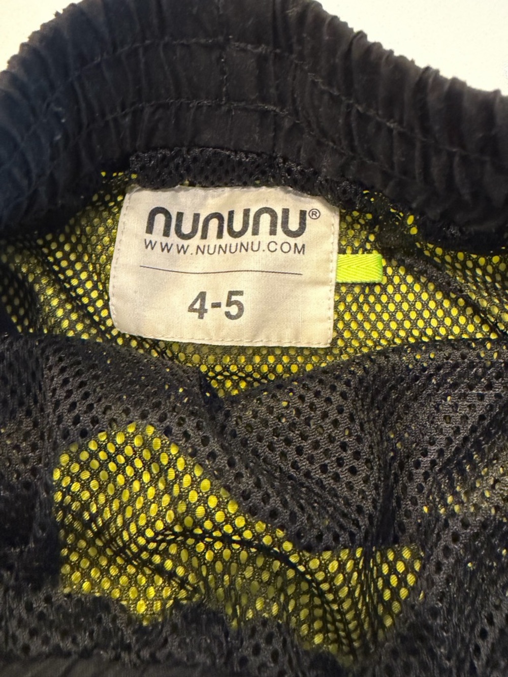 nununu Black Swim Shorts with Neon Yellow Lining and Star Detail - Picture 2 of 3